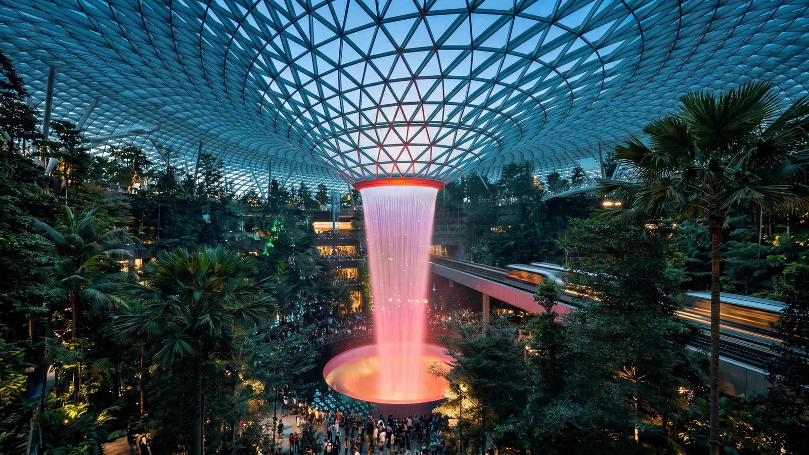 The Rain Vortex at Jewel Changi Airport at twilight